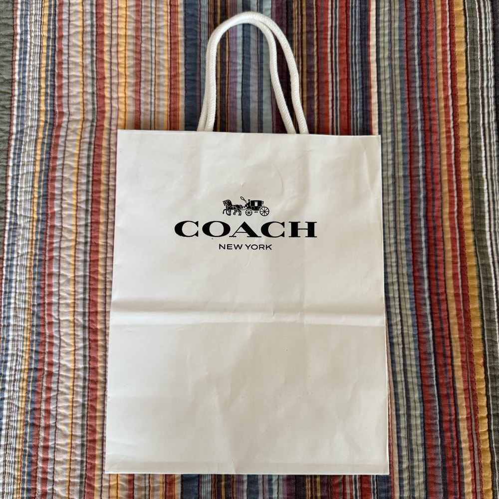 Coach white paper shopping or gift bag. Black Logo. White Rope Handles 10x8x4.5